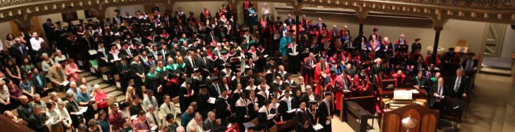 A photo of hundreds of graduates at the University of Divinity March 2018 ceremony, taken from above looking down, from the balcony of St Michael's Uniting church