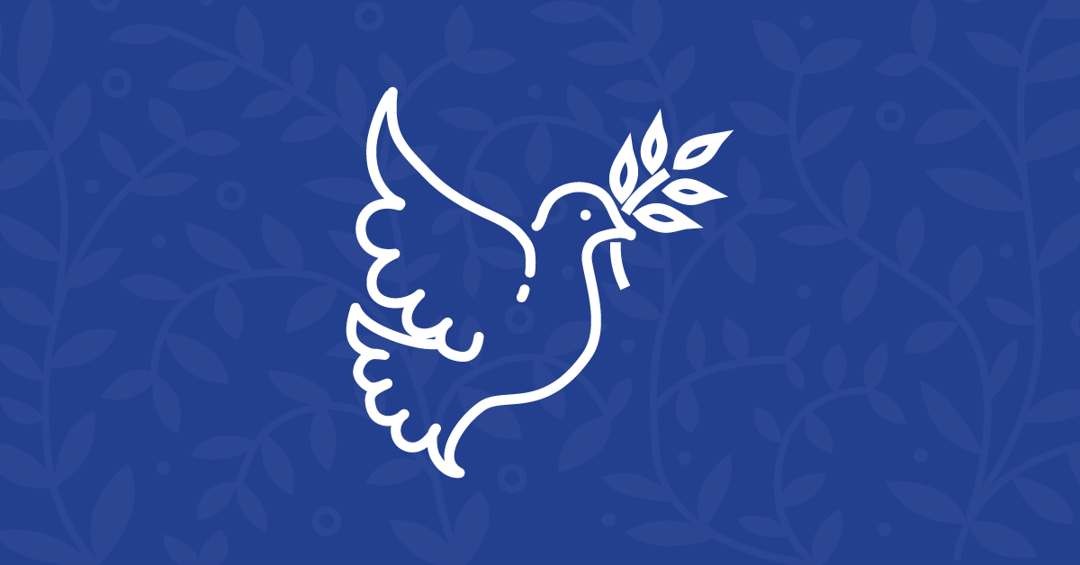 A dove in flight, carrying an olive branch